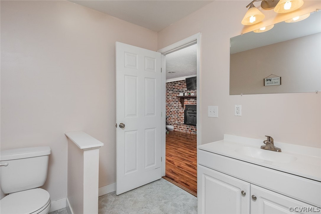 9420 Townsend Road Providence Forge, VA 23140 - Photo 19 of 29 a bathroom with a sink toilet and shower