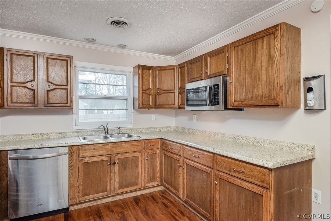 9420 Townsend Road Providence Forge, VA 23140 - Photo 7 of 29 a kitchen with stainless steel appliances granite countertop a sink stove and microwave