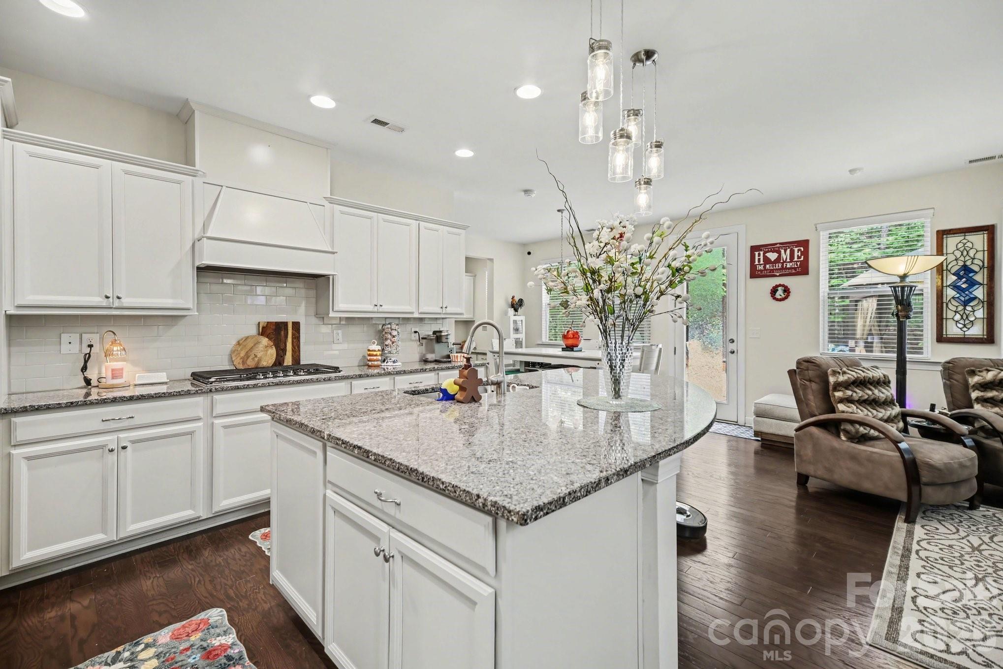 5327 Baker Lane Clover, SC 29710 - Photo 14 of 34 a kitchen with kitchen island granite countertop a sink and center island