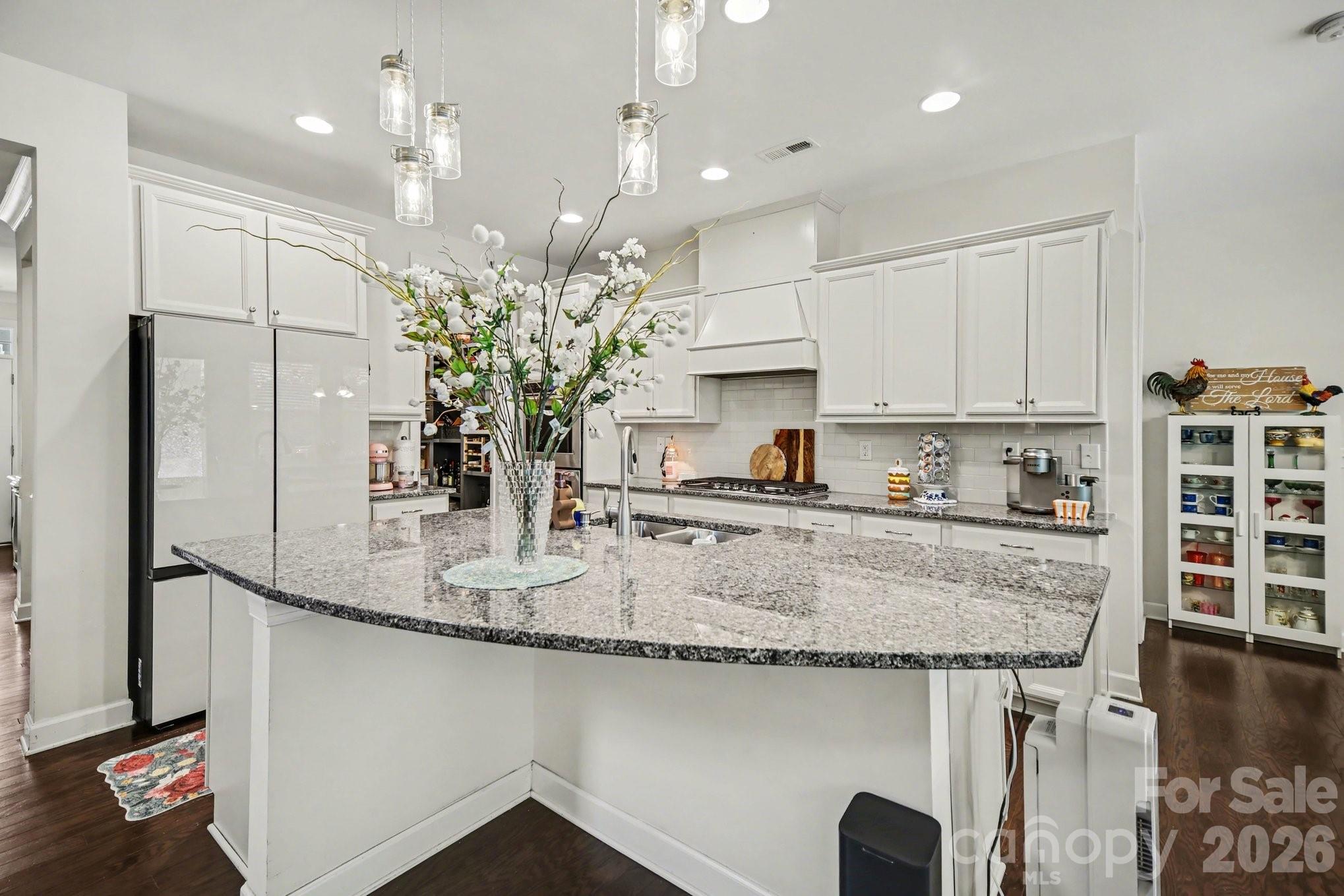 5327 Baker Lane Clover, SC 29710 - Photo 15 of 34 a kitchen with stainless steel appliances granite countertop a sink refrigerator and cabinets
