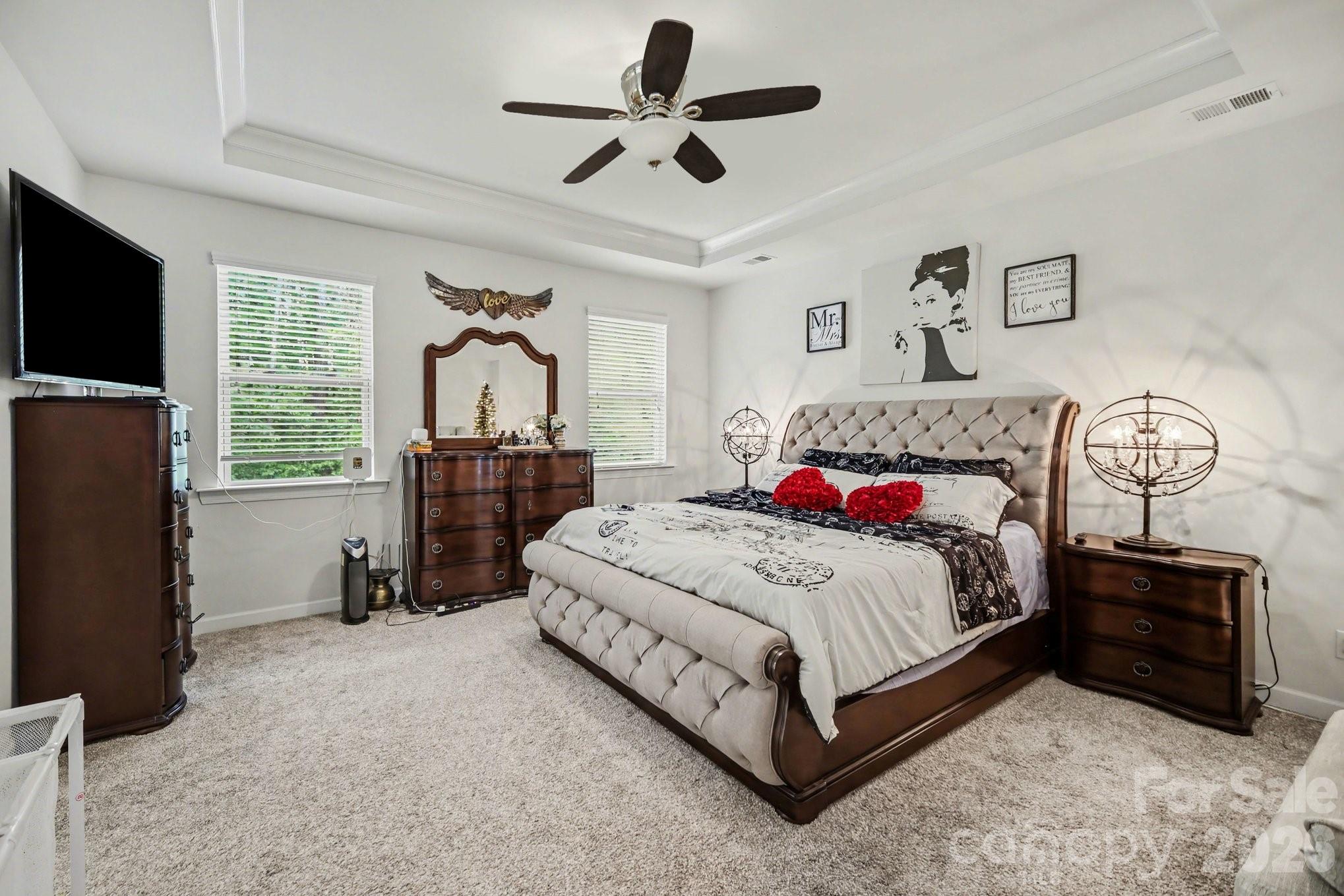 5327 Baker Lane Clover, SC 29710 - Photo 16 of 34 a bedroom with a bed dresser and a window