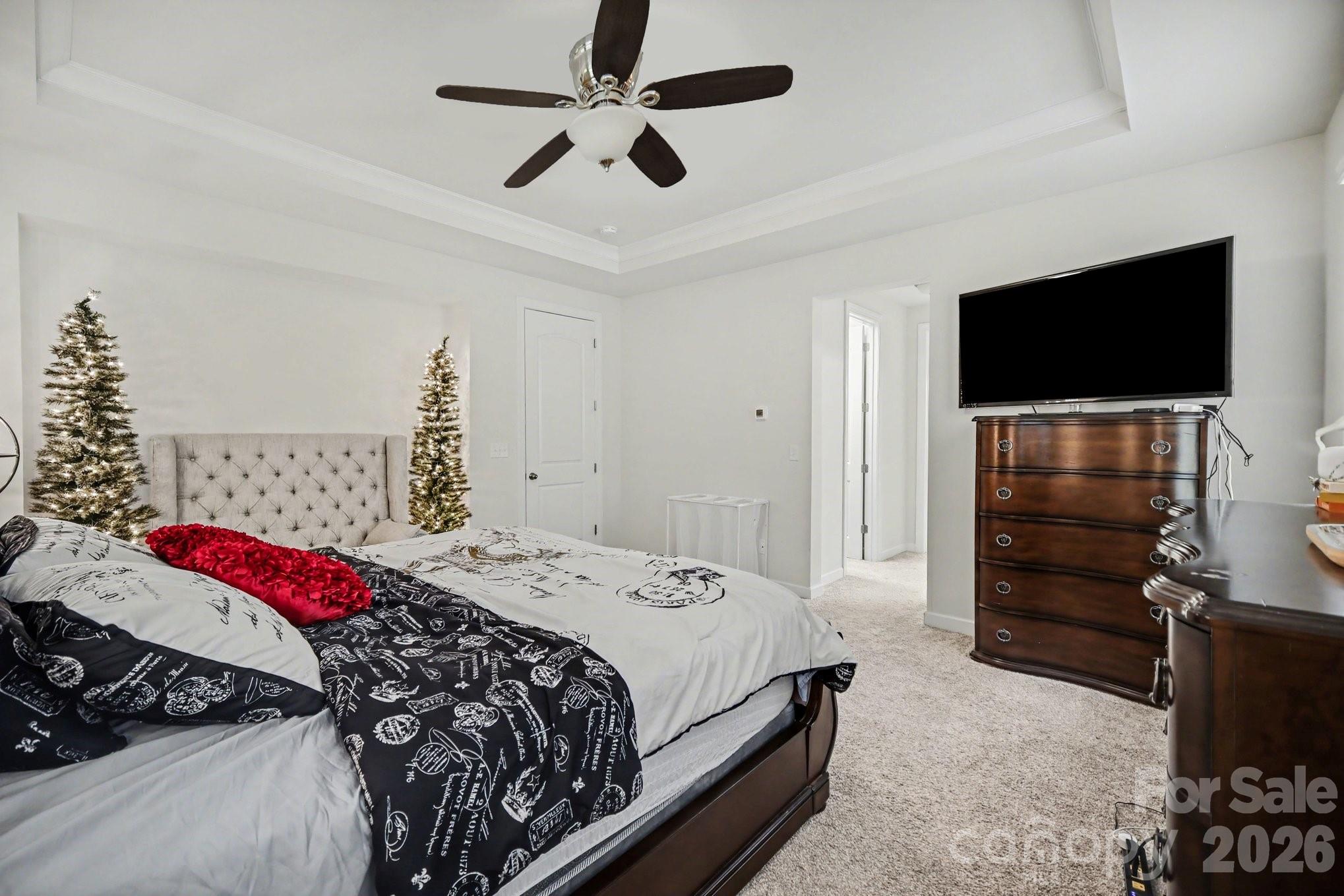 5327 Baker Lane Clover, SC 29710 - Photo 17 of 34 a bedroom with a bed and a flat screen tv