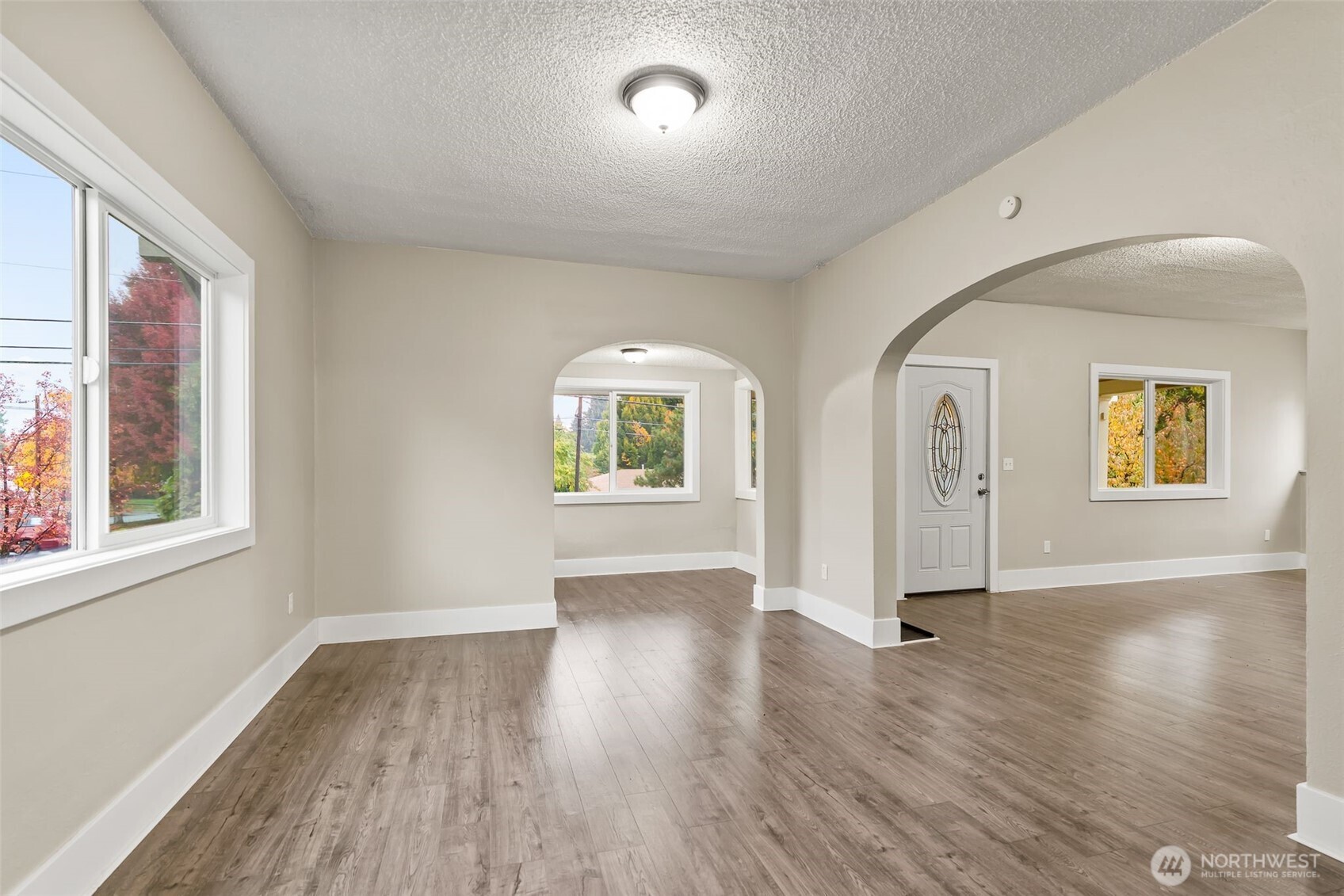 2214 Summitview Avenue Yakima, WA 98902 - Photo 11 of 30 an empty room with wooden floor and windows