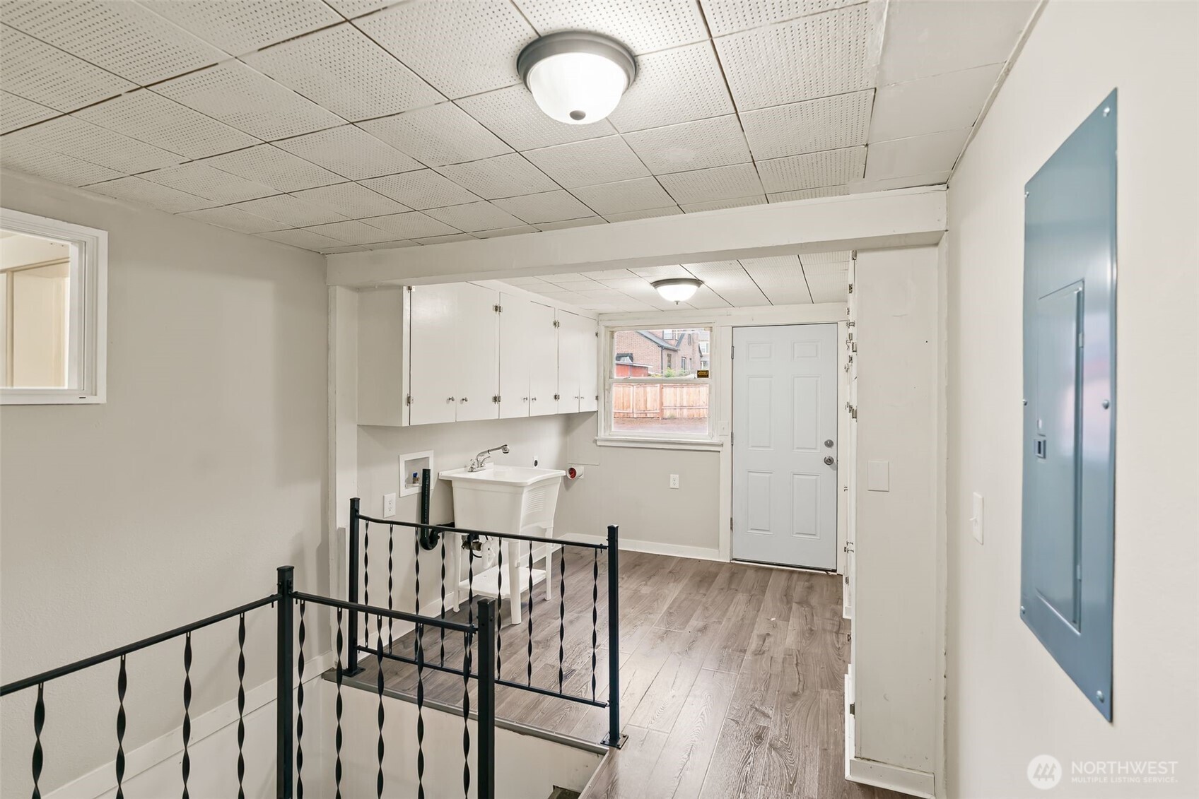 2214 Summitview Avenue Yakima, WA 98902 - Photo 19 of 30 a view of a hallway with wooden floor