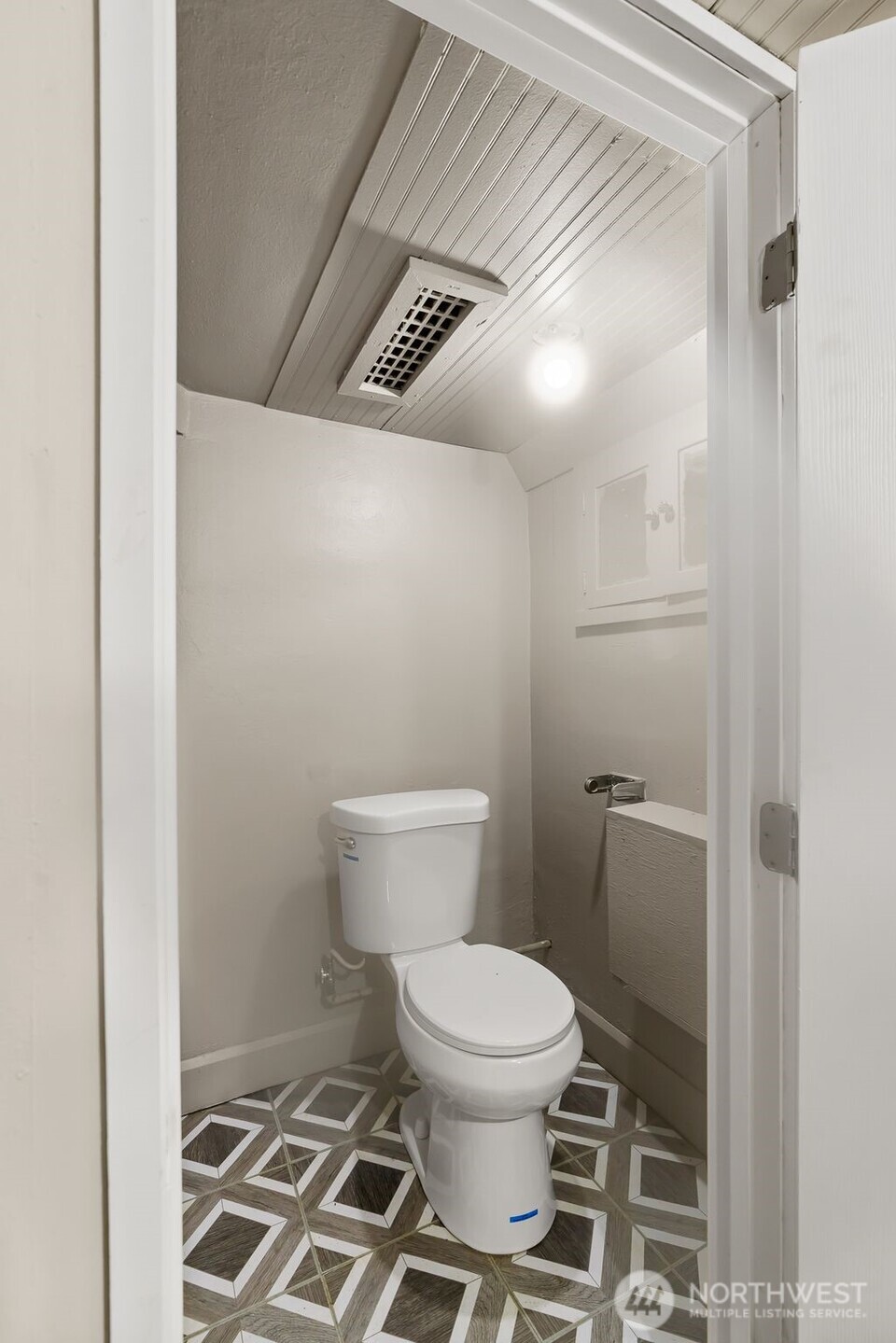 2214 Summitview Avenue Yakima, WA 98902 - Photo 23 of 30 a white toilet sitting next to a shower