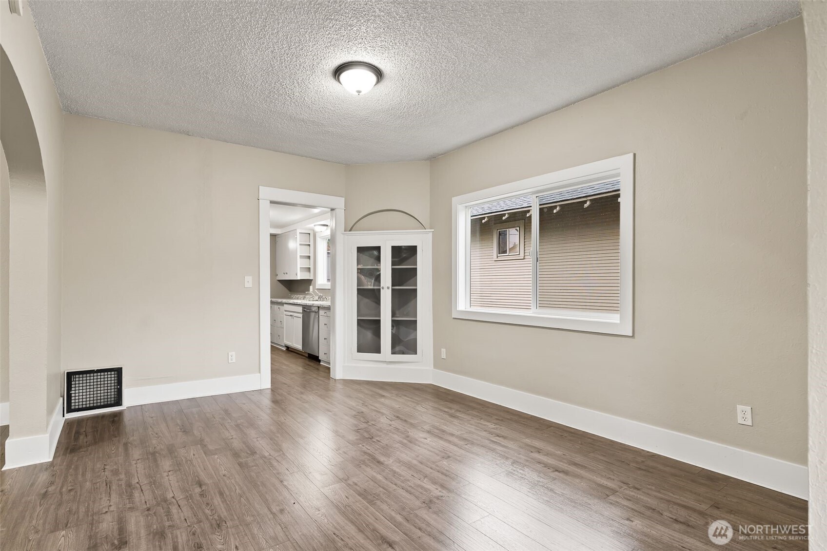 2214 Summitview Avenue Yakima, WA 98902 - Photo 10 of 30 an empty room with wooden floor and windows