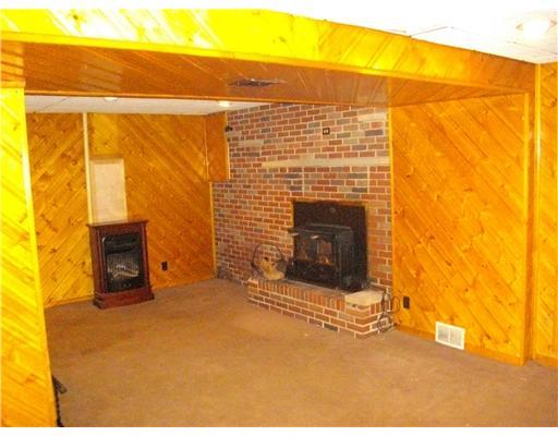 5554 Gibson Road Gibsonia, PA 15044 - Photo 17 of 18 Den/Family/Great Room. Finished Family Room makes up One Third of Lower Level. Has very nice, working Fireplace Insert. Would also make a great Man Cave.