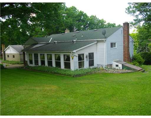5554 Gibson Road Gibsonia, PA 15044 - Photo 5 of 18 Sunroom. Back of House showing Sun Porch Addition.