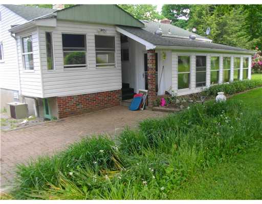 5554 Gibson Road Gibsonia, PA 15044 - Photo 6 of 18 Patio/Deck. Back of House Right Side view with Patio