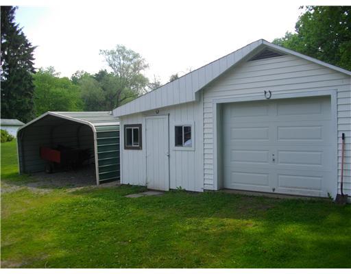 5554 Gibson Road Gibsonia, PA 15044 - Photo 10 of 18 Parking Lot/Garage. One-Car Garage w/attached workshop & Two-Car carport