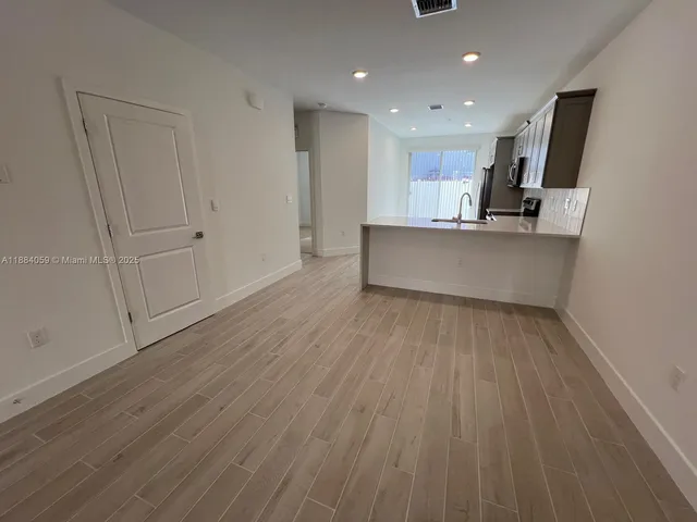 an empty room with a door