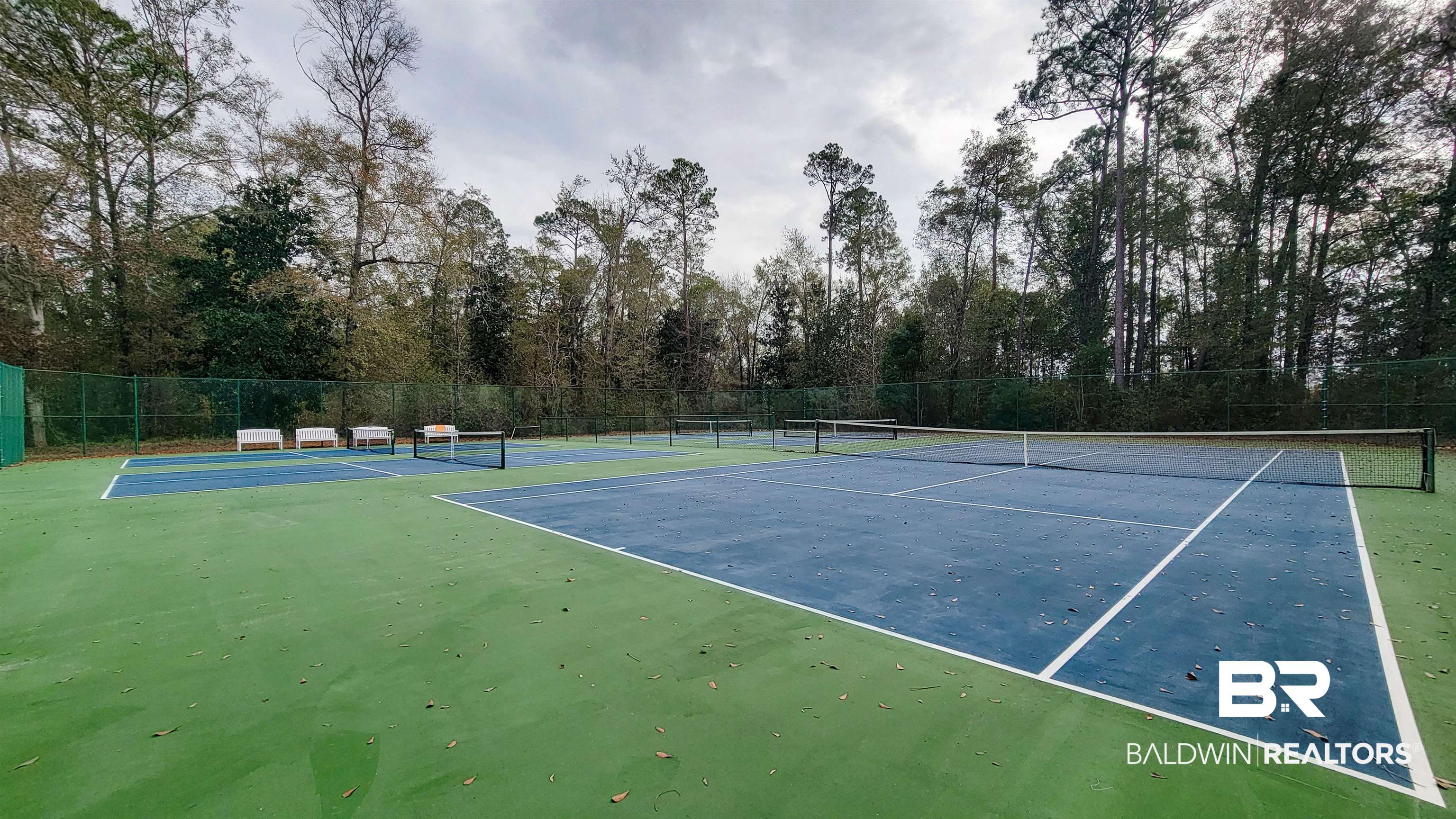 214 Hemingway Loop Foley, AL 36535 - Photo 52 of 67 View of tennis court with community basketball court