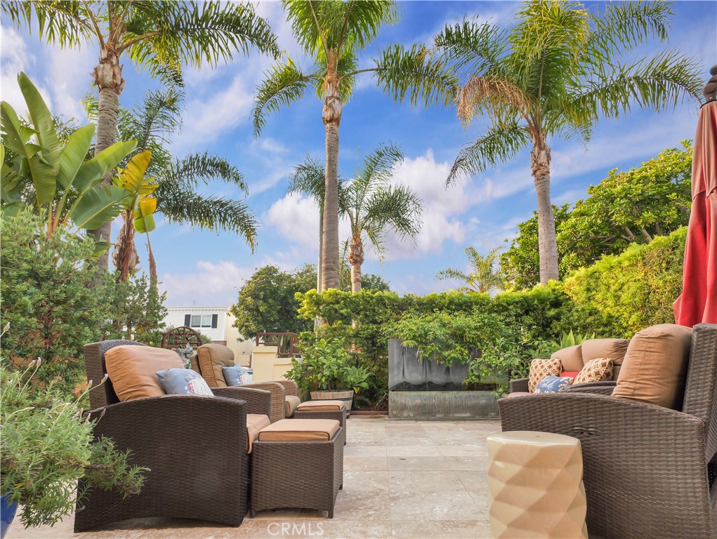 320 15th Street Huntington Beach, CA 92648 - Photo 2 of 49 front view of a house with a patio
