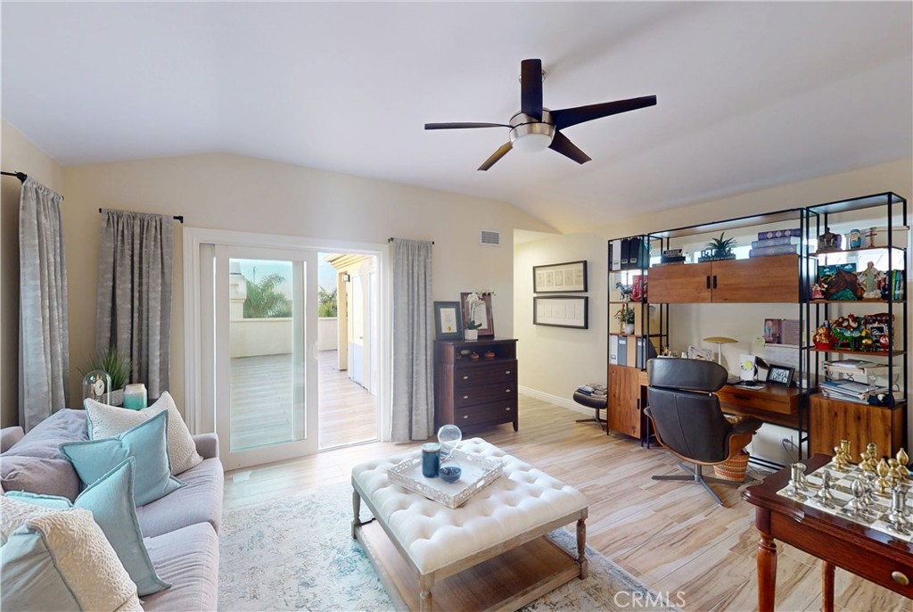 320 15th Street Huntington Beach, CA 92648 - Photo 36 of 49 a living room with furniture and a window