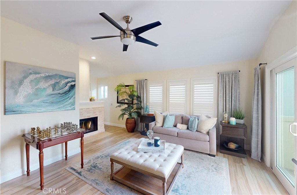 320 15th Street Huntington Beach, CA 92648 - Photo 38 of 49 a living room with furniture and a large window