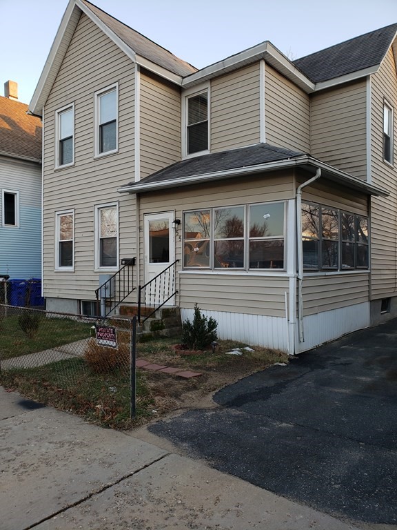 55 Tyler Street Springfield, MA 01109 - Photo 2 of 32 a view of a house with backyard