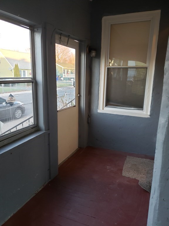 55 Tyler Street Springfield, MA 01109 - Photo 3 of 32 a view of an empty room with a window