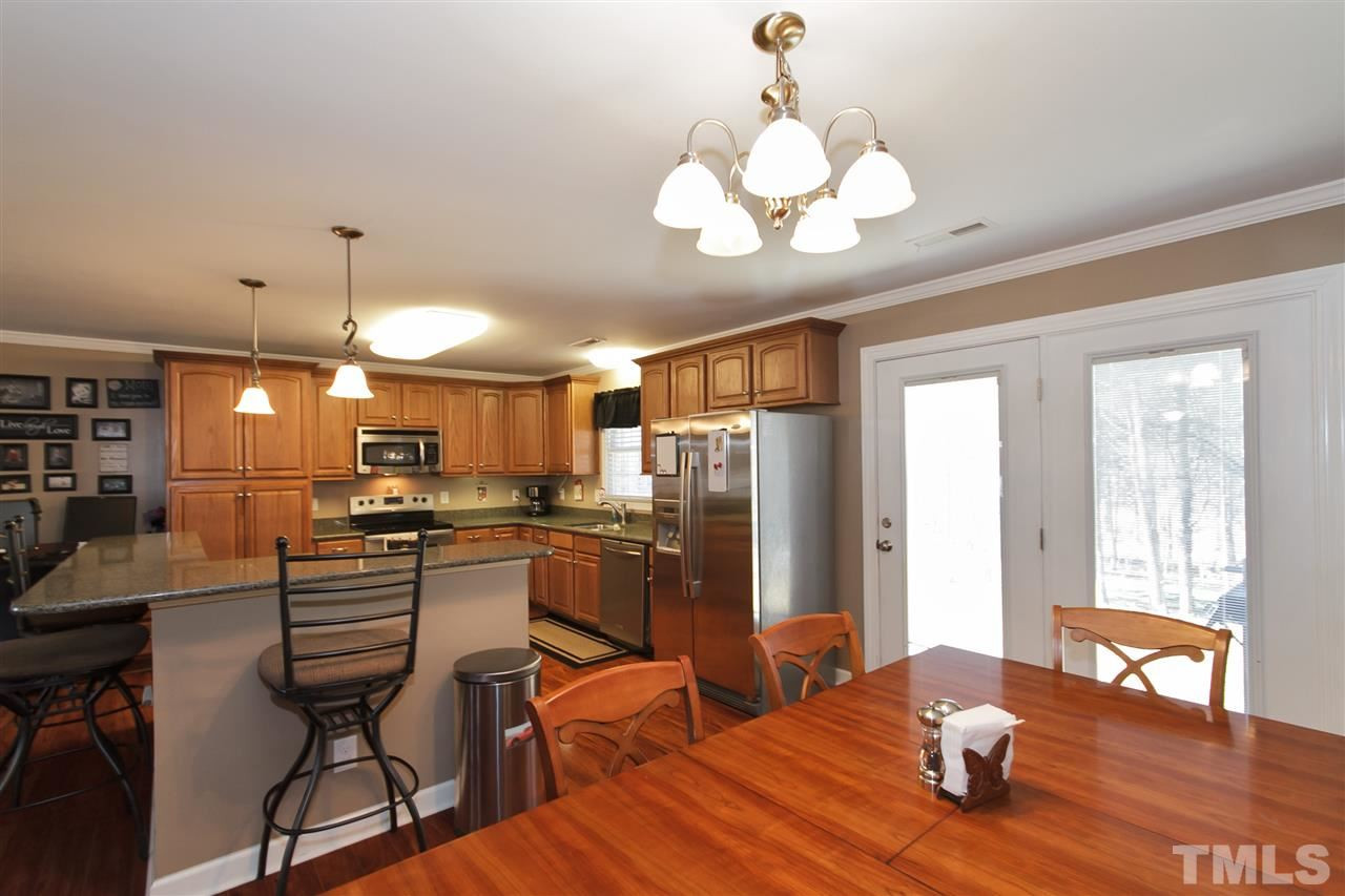 5911 Stockard Road Graham, NC 27253 - Photo 8 of 25 Dining Open to Kitchen with Patio Access