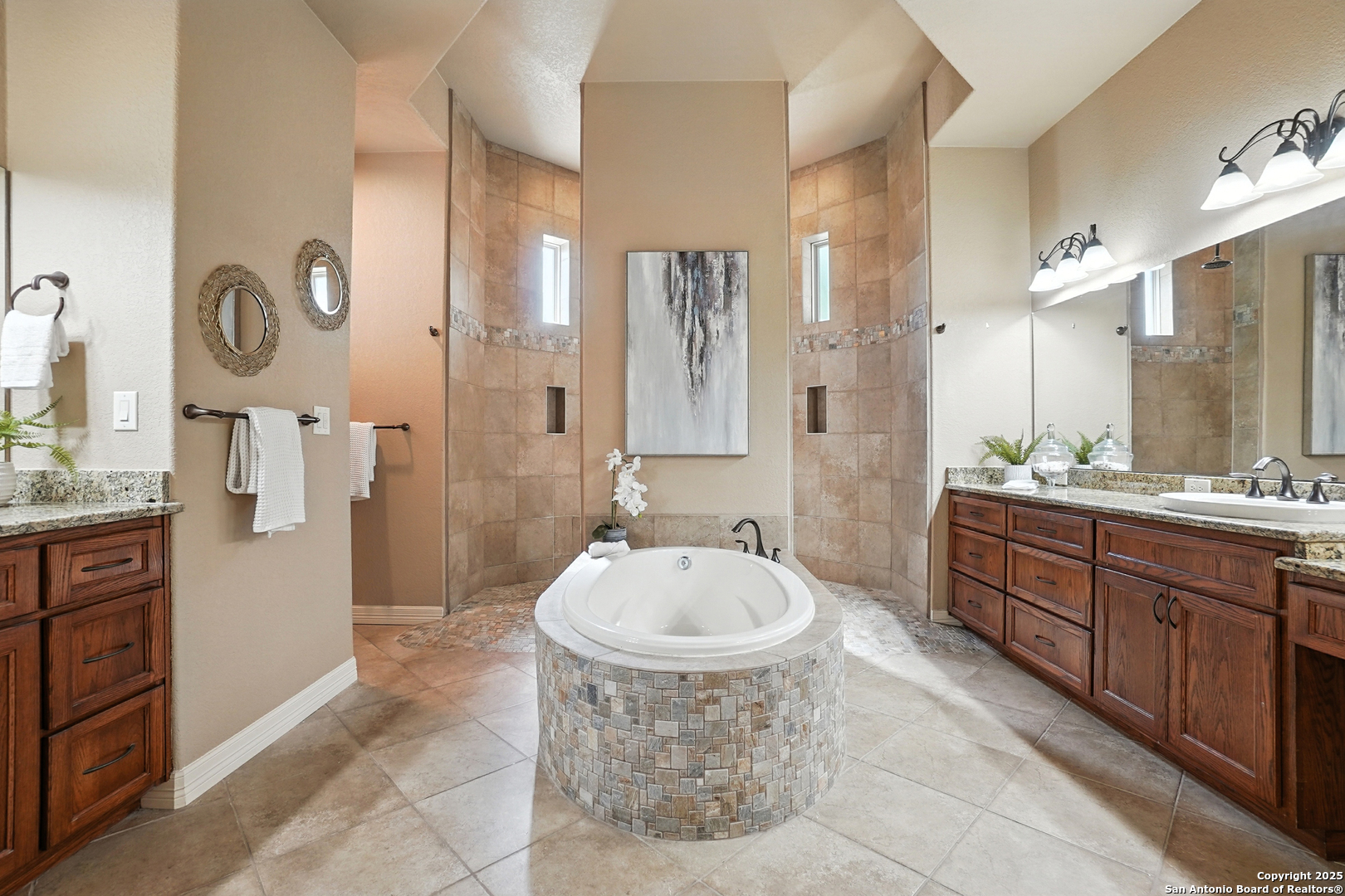 7607 Sky Loop Garden Ridge, TX 78266 - Photo 21 of 49 a spacious bathroom with a tub sink and mirror