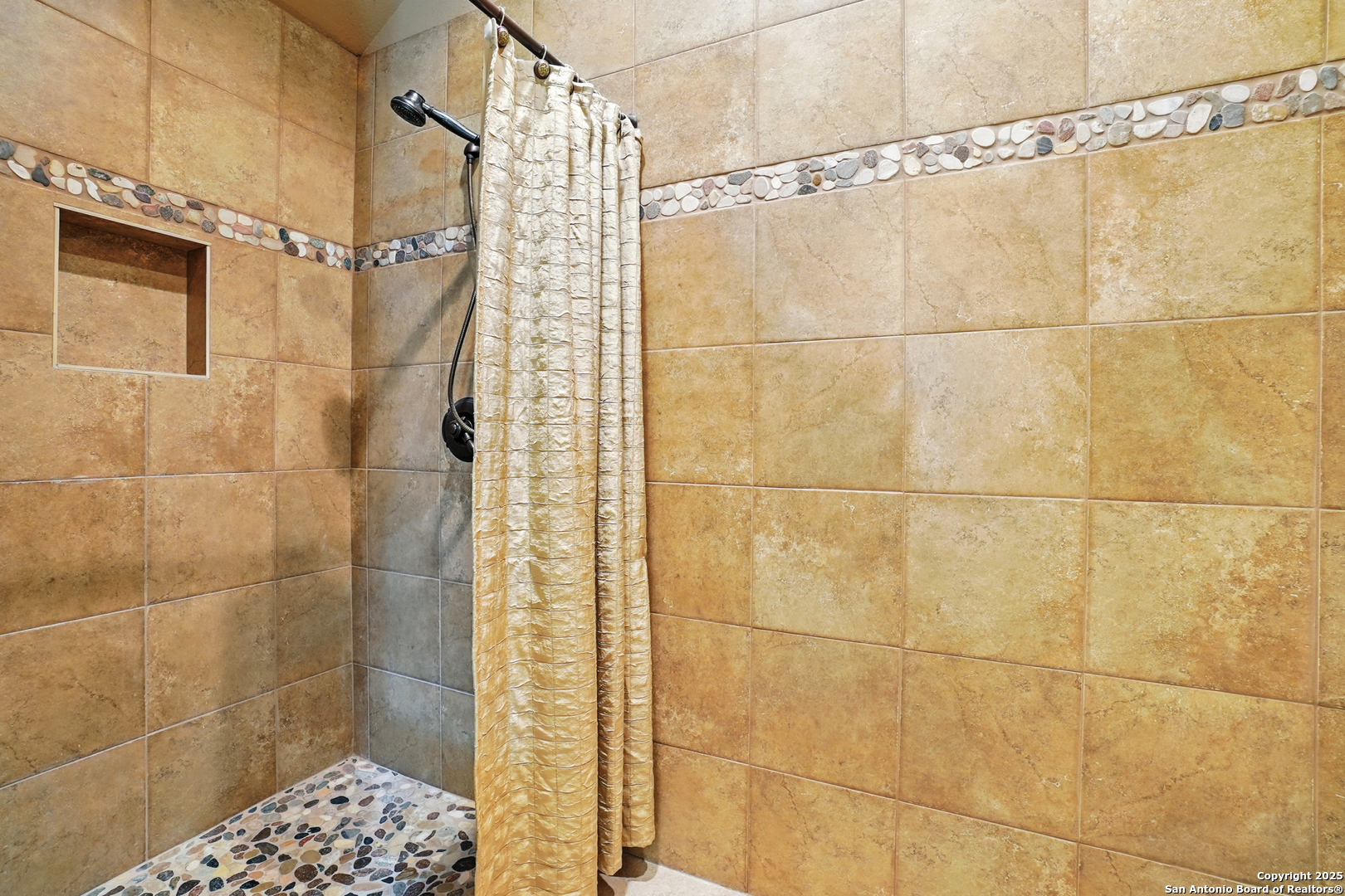 7607 Sky Loop Garden Ridge, TX 78266 - Photo 27 of 49 a bathroom with a shower