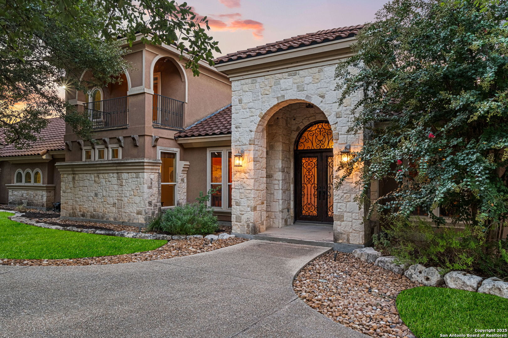 7607 Sky Loop Garden Ridge, TX 78266 - Photo 3 of 49 a front view of a house with garden