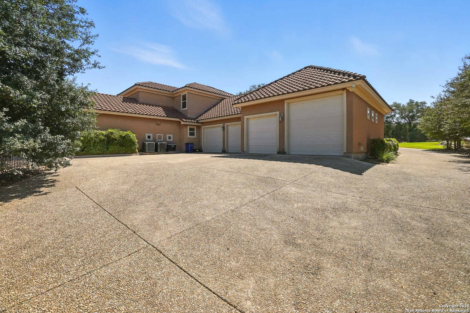 7607 Sky Loop Garden Ridge, TX 78266 - Photo 38 of 49 a front view of a house with a yard and garage