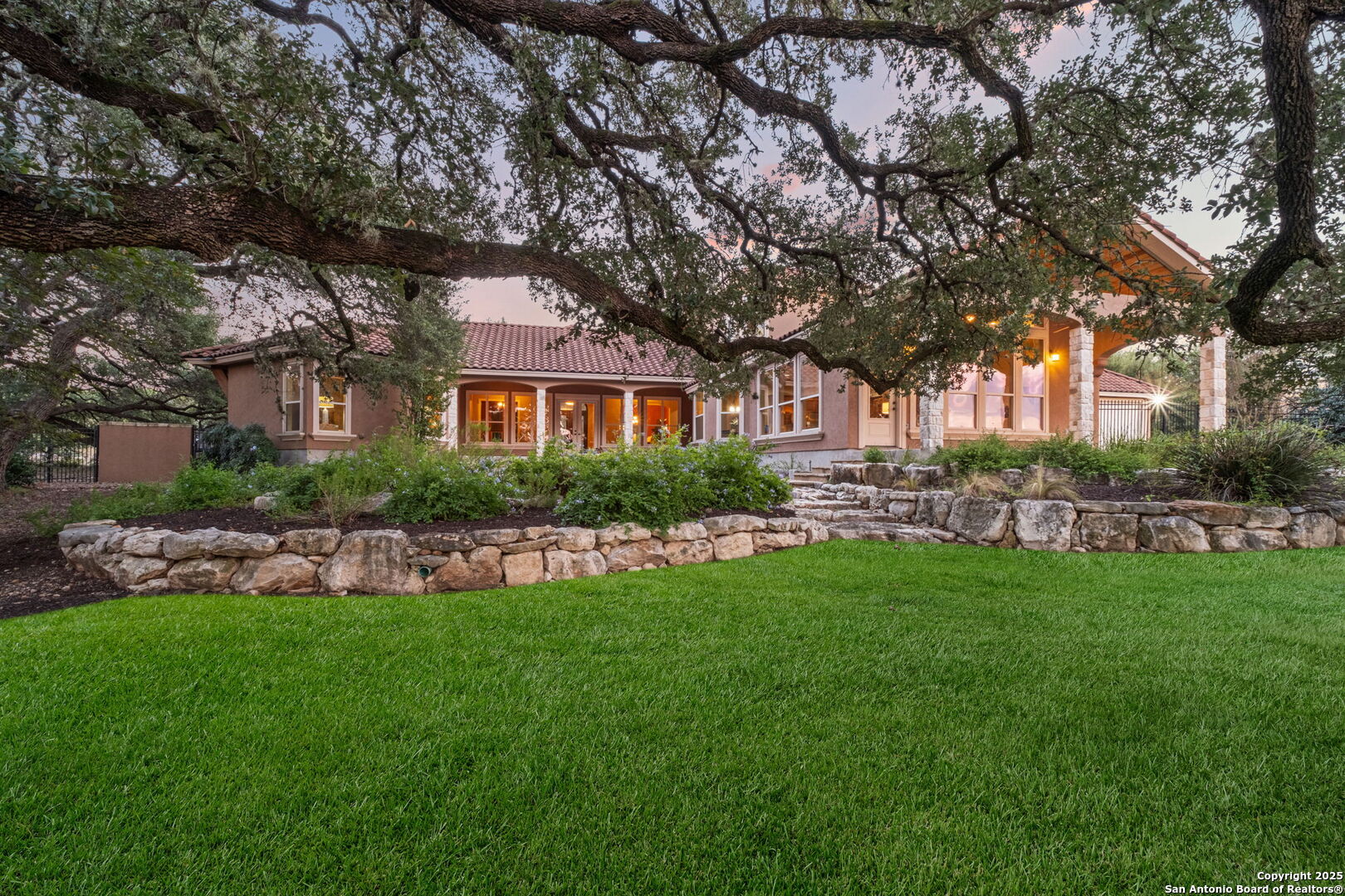 7607 Sky Loop Garden Ridge, TX 78266 - Photo 40 of 49 a front view of house with a garden