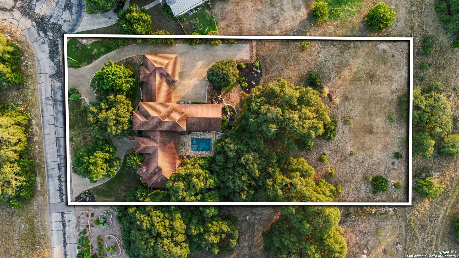 7607 Sky Loop Garden Ridge, TX 78266 - Photo 43 of 49 a view of a house and a street view