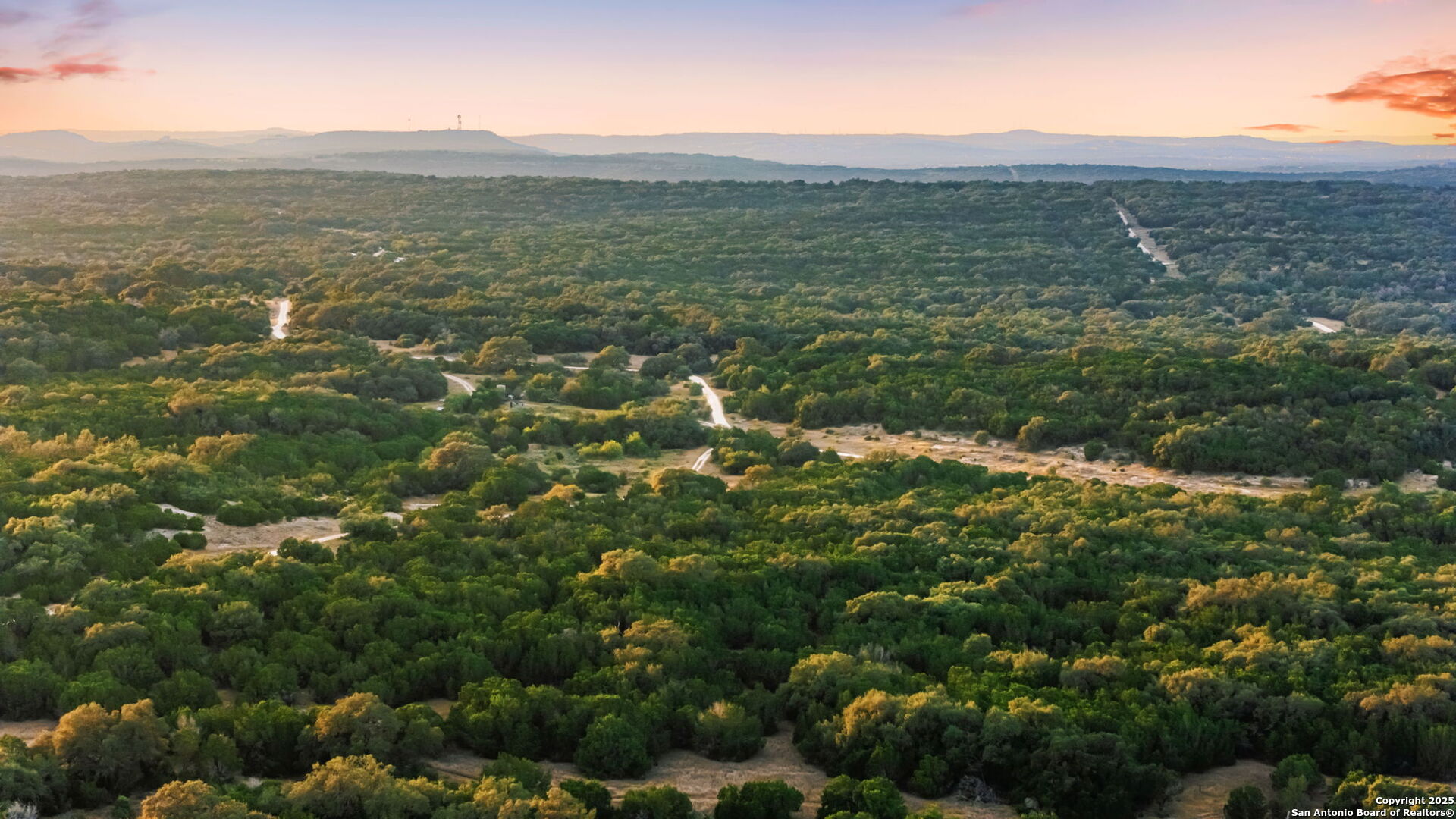 7607 Sky Loop Garden Ridge, TX 78266 - Photo 48 of 49 a view of a lush green field