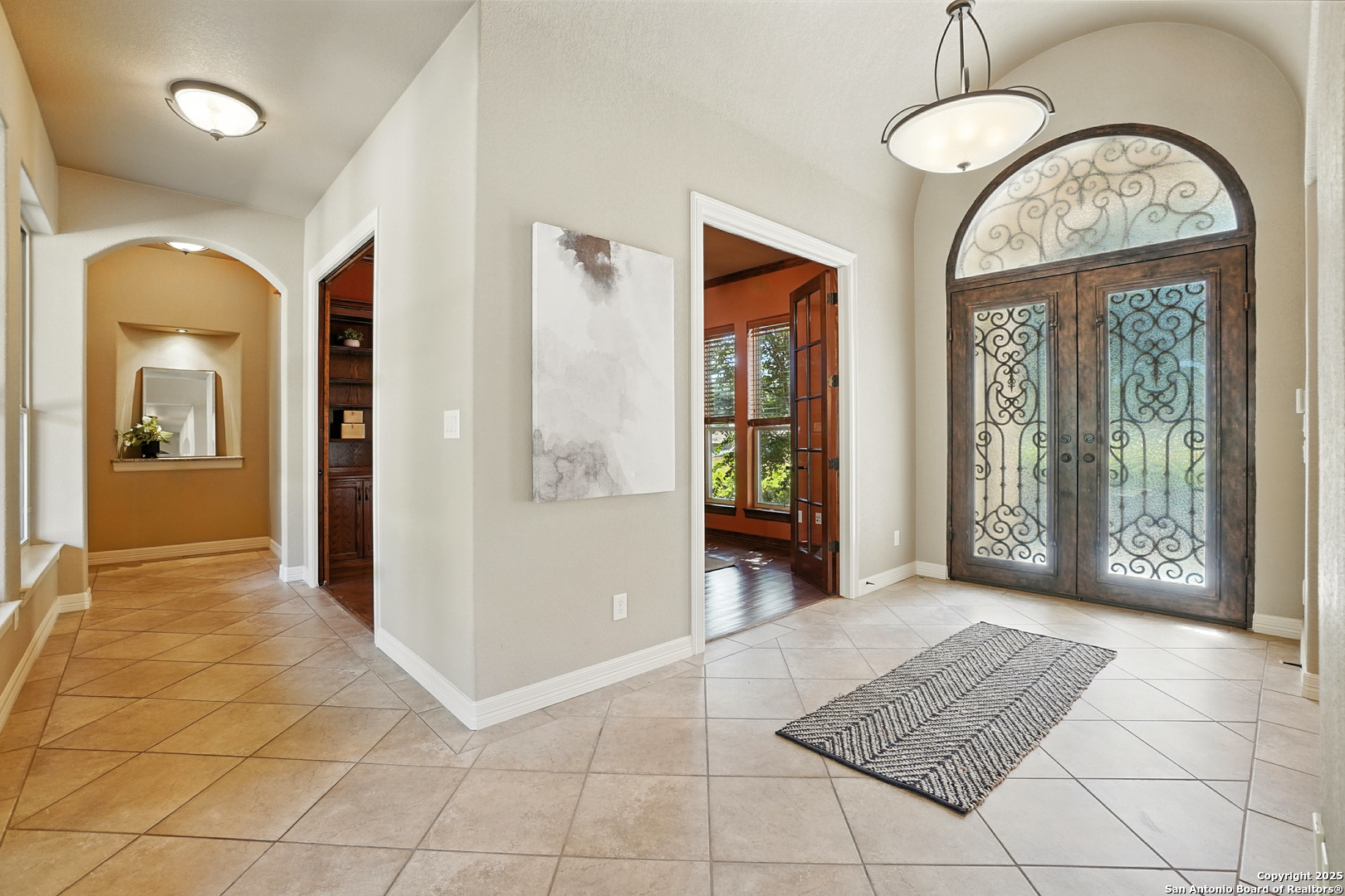 7607 Sky Loop Garden Ridge, TX 78266 - Photo 6 of 49 wooden floor with a chandelier and a rug