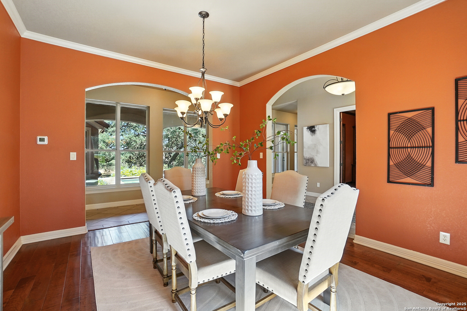 7607 Sky Loop Garden Ridge, TX 78266 - Photo 9 of 49 a dining room with furniture a chandelier and window