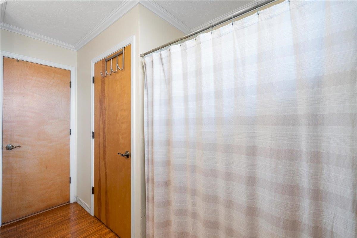 119 Ka Drive Kula, HI 96790 - Photo 26 of 45 a view of a bathroom with shower curtain