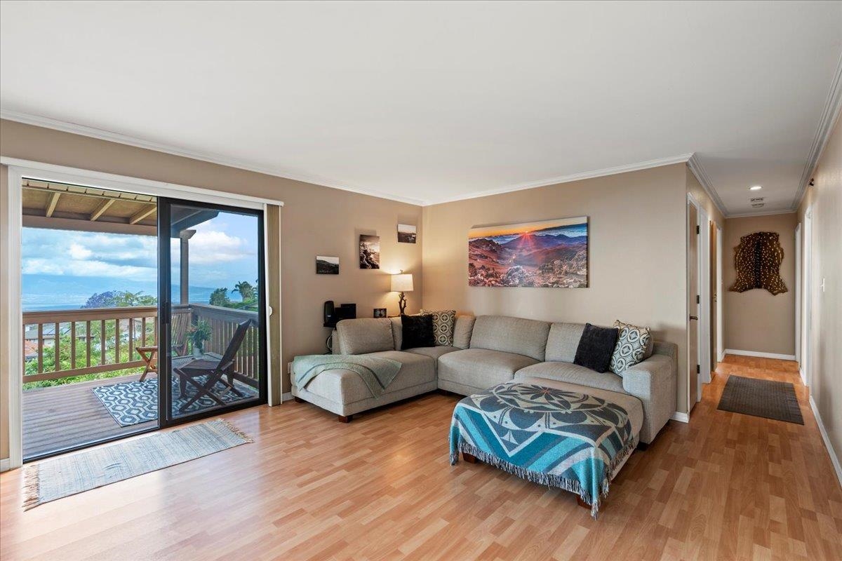119 Ka Drive Kula, HI 96790 - Photo 4 of 45 a living room with furniture and a flat screen tv