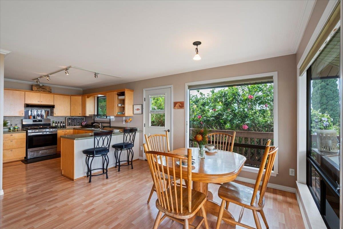 119 Ka Drive Kula, HI 96790 - Photo 7 of 45 a dining room with furniture and wooden floor