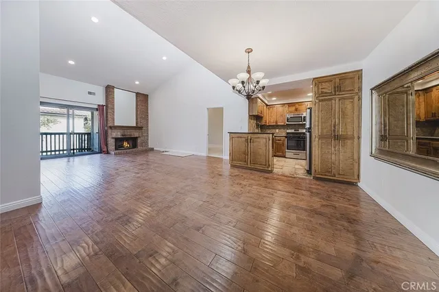 a view of a livingroom with a kitchen