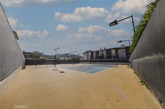 a view of a building terrace with glass door