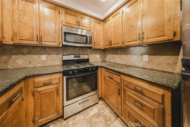 a view of a hallway with a chandelier