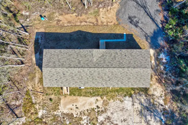 a view of swimming pool with a yard