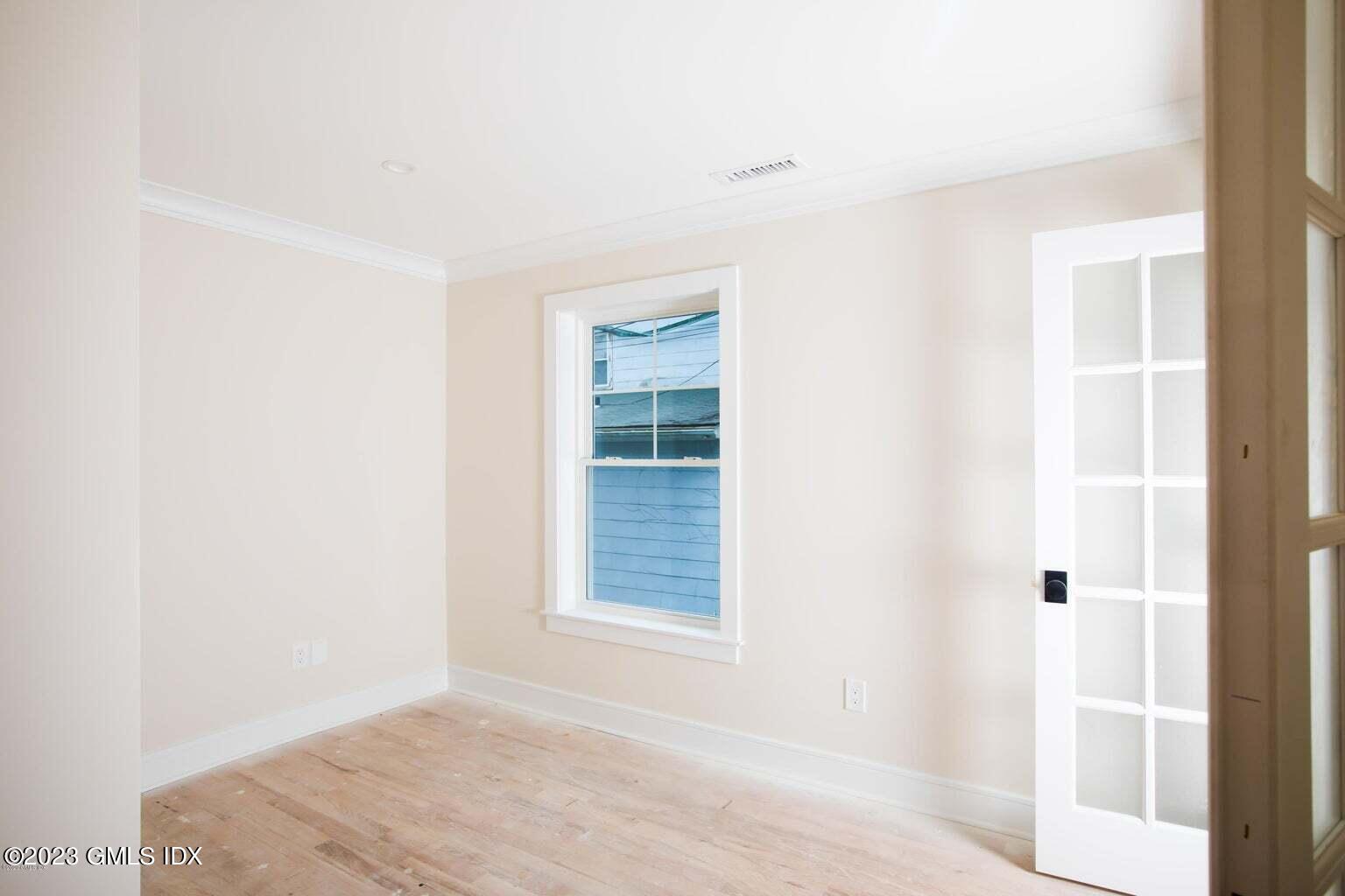 292 Delavan Avenue, Unit 2 Greenwich, CT 06830 - Photo 8 of 22 a view of an empty room