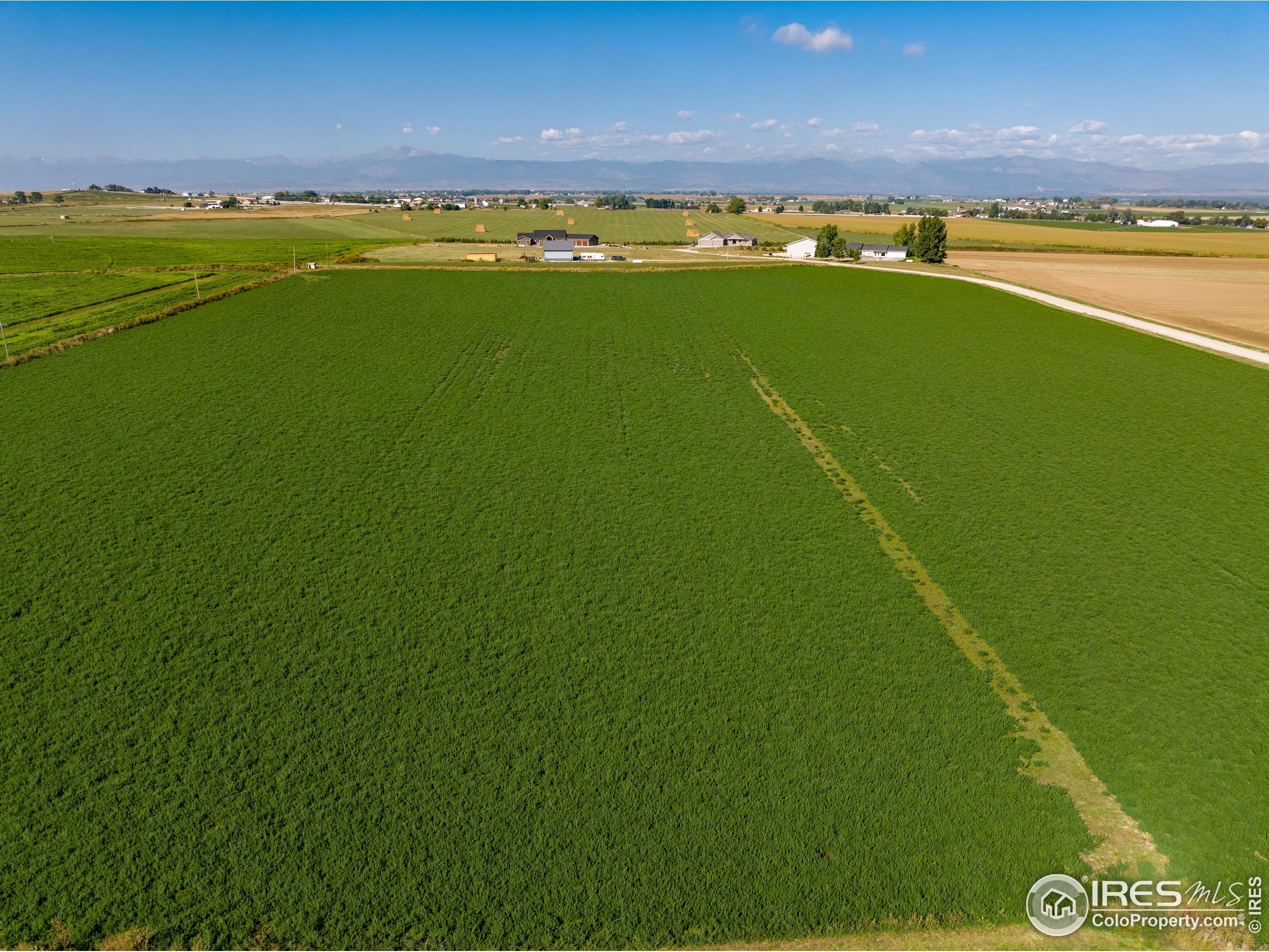 6012 Quiet View Court Loveland, CO 80537 - Photo 4 of 8 a view of an ocean and a houses