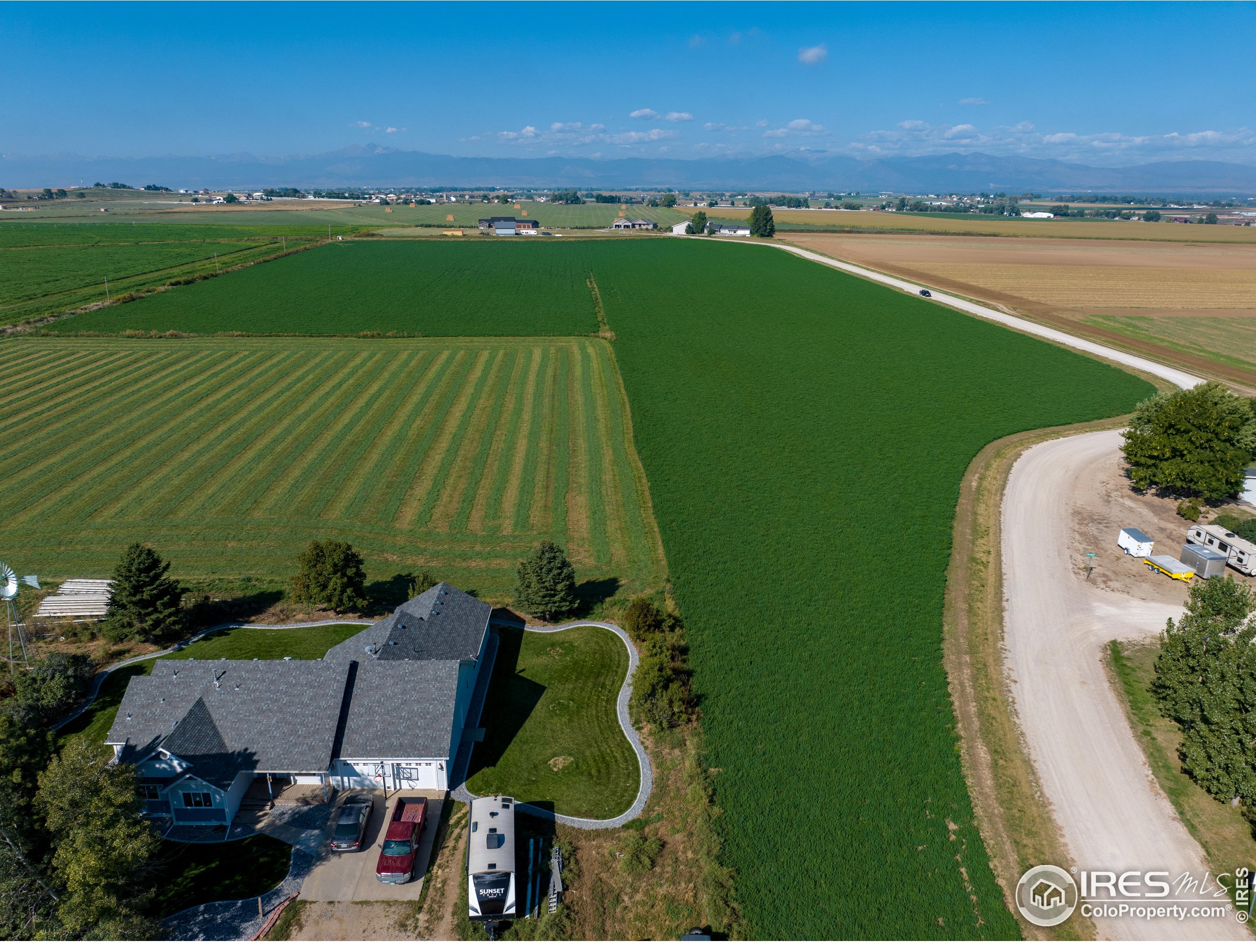 6012 Quiet View Court Loveland, CO 80537 - Photo 7 of 8 an aerial view of a golf course with parking space