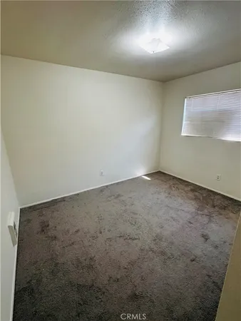 an empty room with a workbench