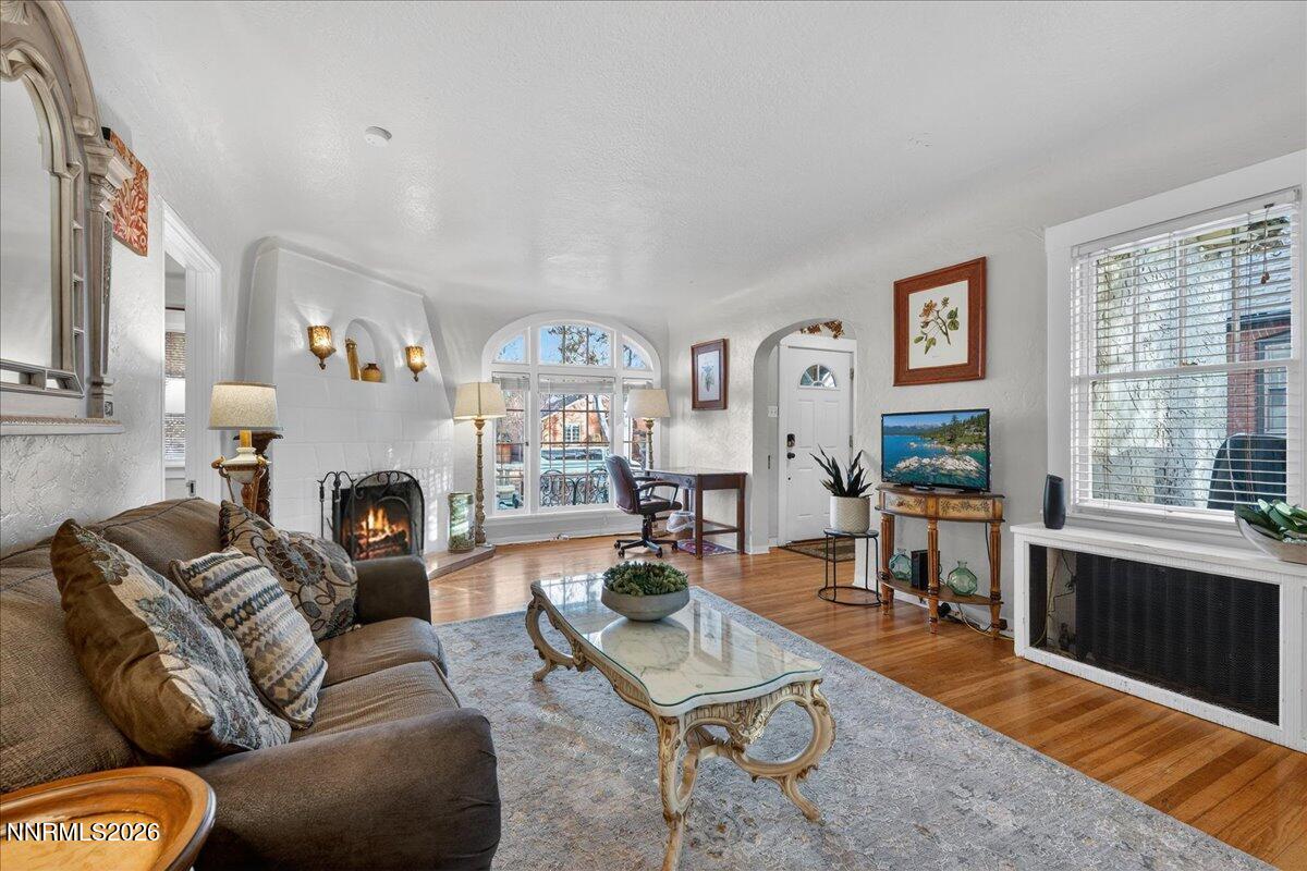 611 Nixon Avenue Reno, NV 89509 - Photo 2 of 43 a living room with furniture fireplace and window