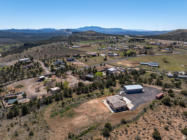 62 North Lucky 7 Road Veyo, UT 84782 - Photo 40 of 43 Aerial view of property's location featuring a mountainous background and rural landscape