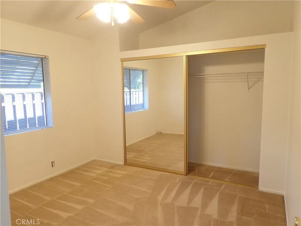 27250 Murrieta Road, Unit 332 Menifee, CA 92586 - Photo 15 of 26 a view of an empty room with window