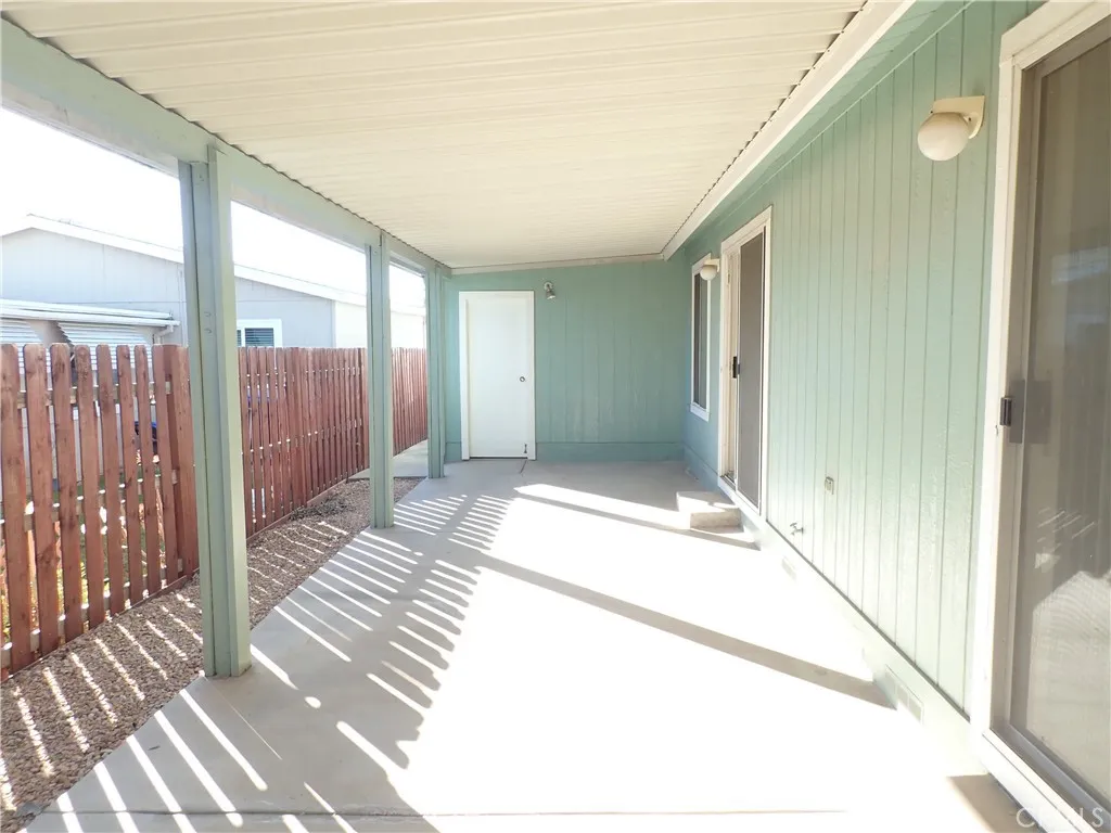 27250 Murrieta Road, Unit 332 Menifee, CA 92586 - Photo 24 of 26 a bathroom with a glass door shower and a bathtub