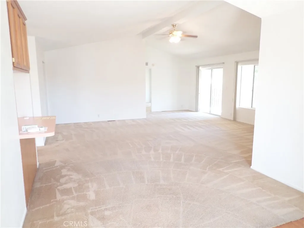 27250 Murrieta Road, Unit 332 Menifee, CA 92586 - Photo 4 of 26 a view of an empty room with a window