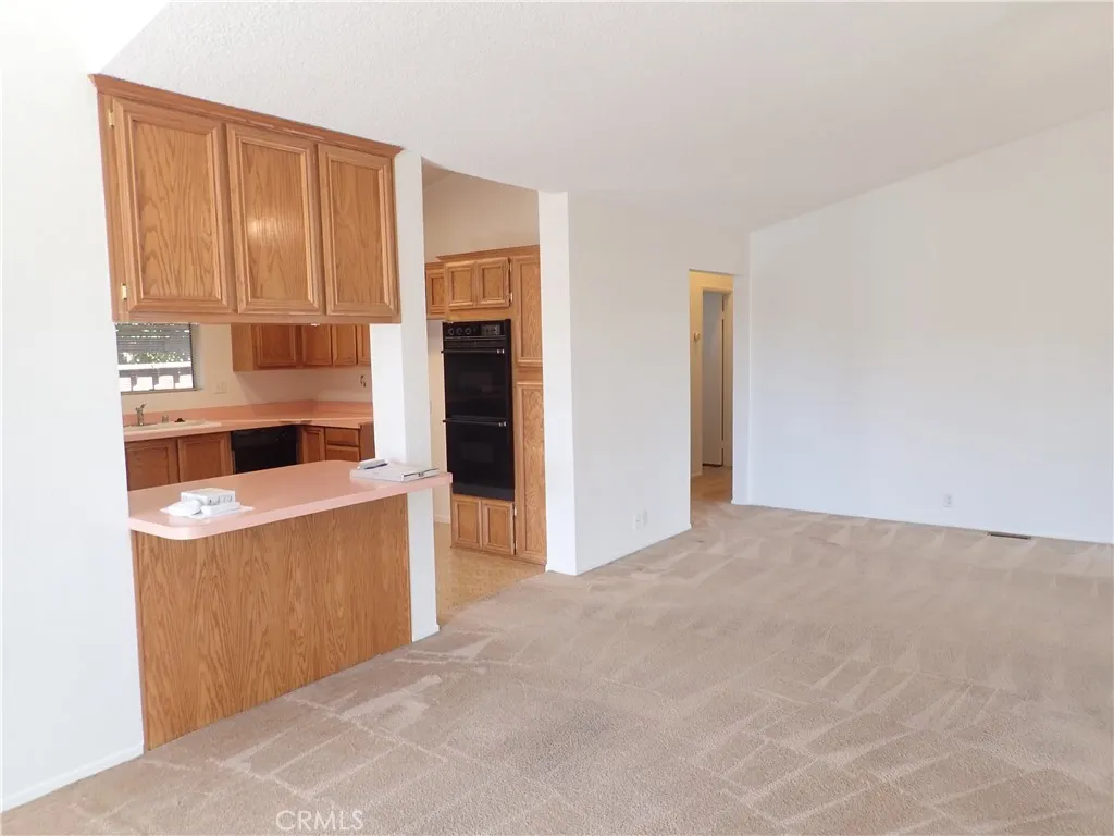 27250 Murrieta Road, Unit 332 Menifee, CA 92586 - Photo 6 of 26 a view of kitchen and utility room