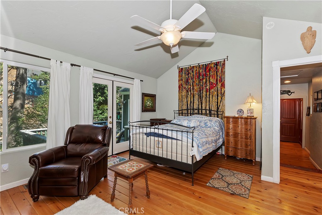 29591 Hook Creek Road Cedar Glen, CA 92321 - Photo 20 of 43 a bedroom with a bed and a couch