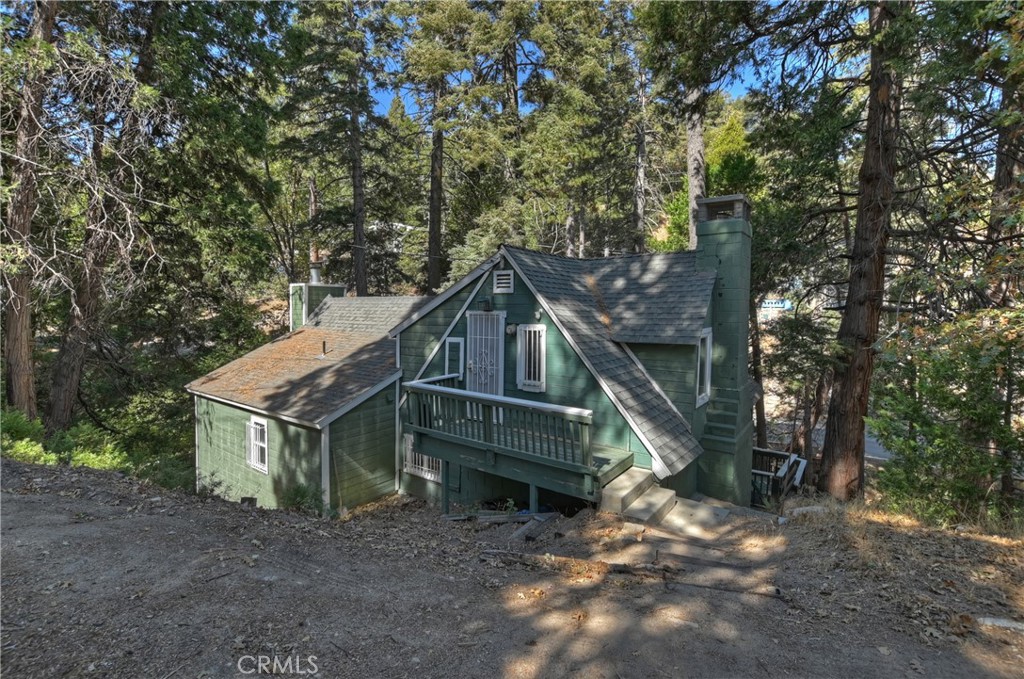 29591 Hook Creek Road Cedar Glen, CA 92321 - Photo 31 of 43 a house with a trees in the background
